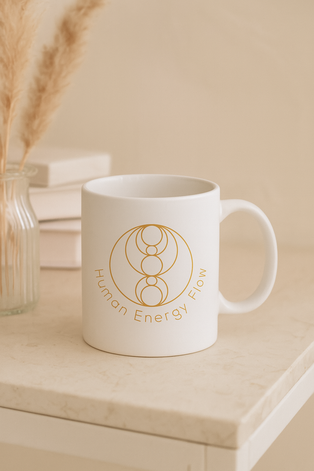 Logo de Human Energy Flow aplicado sobre una taza